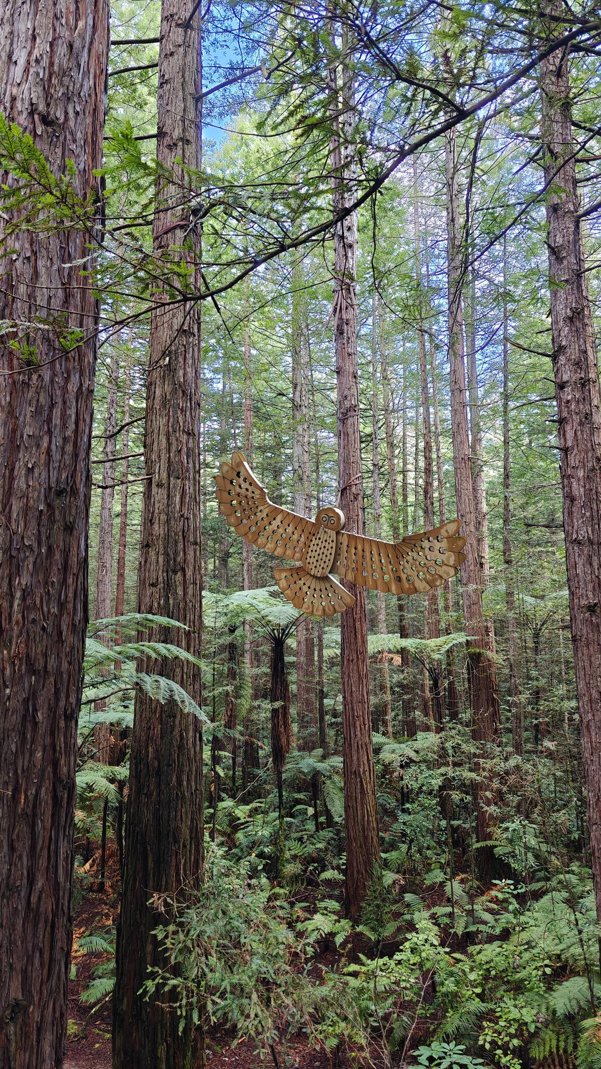 Carved bird sculpture in canopy