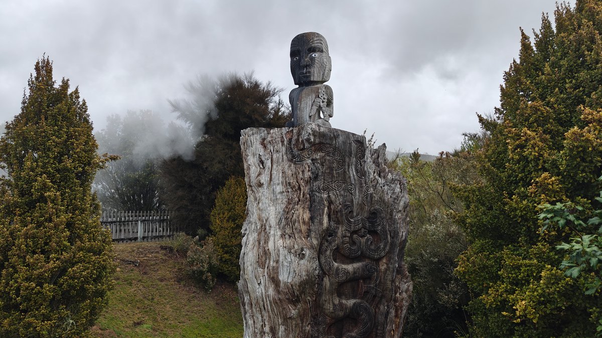 Carved head with steam behind