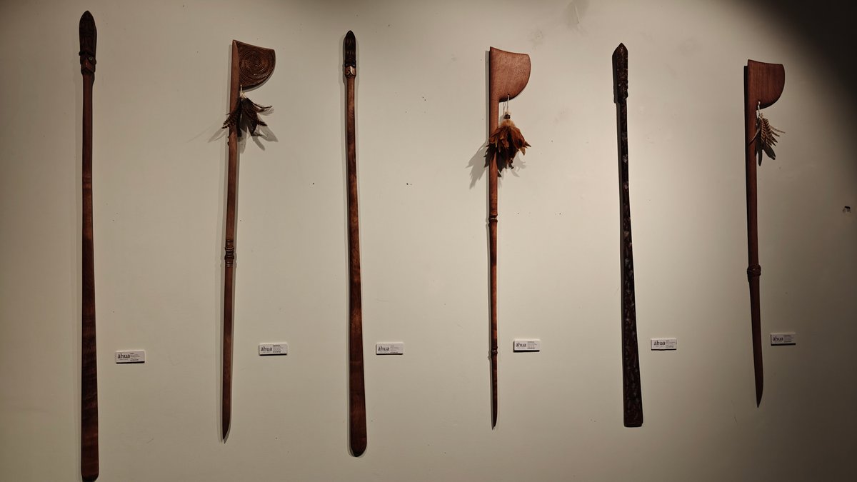 Carved weapons along the wall