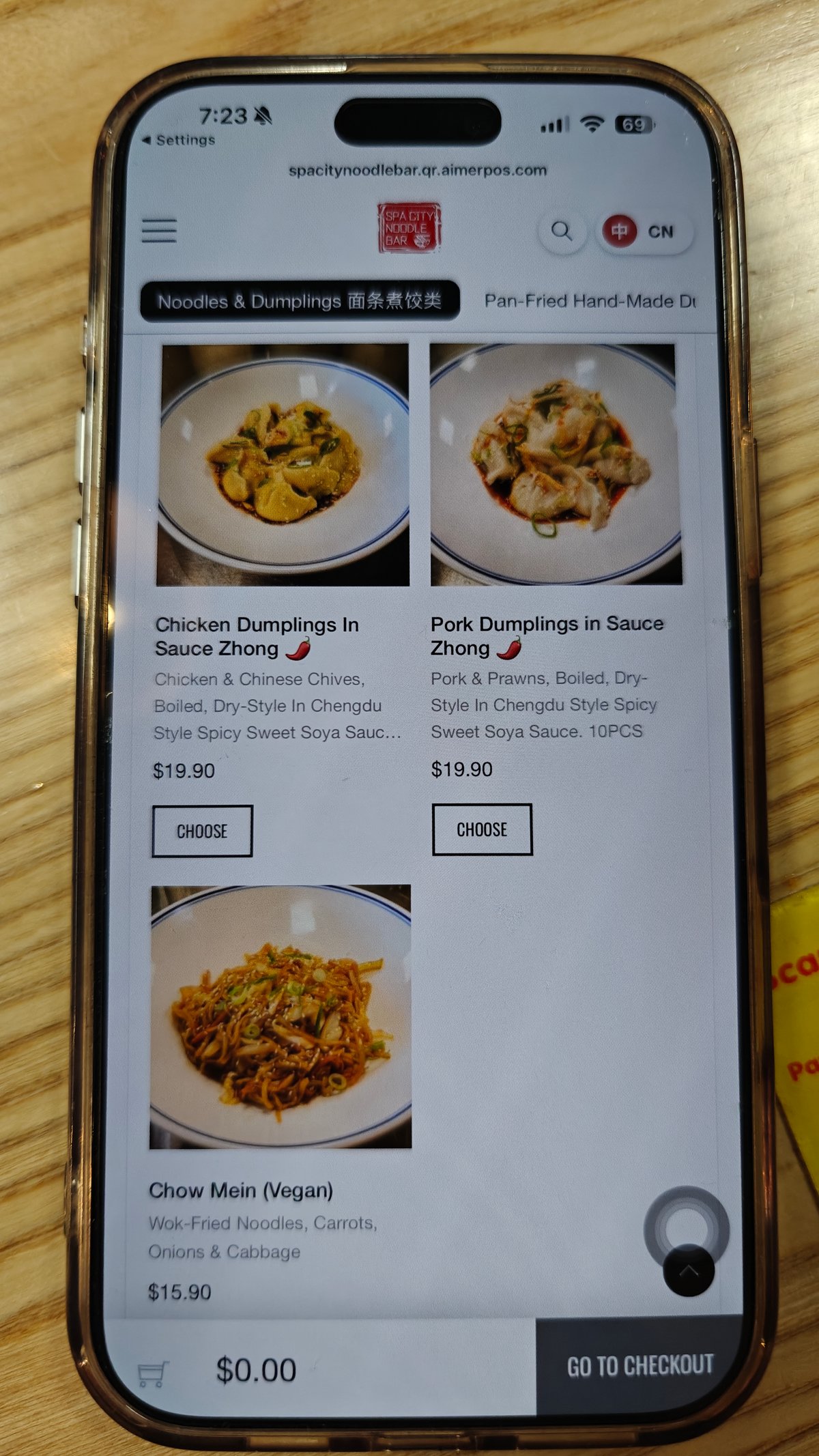 Chicken and pork dumplings in sauce and a