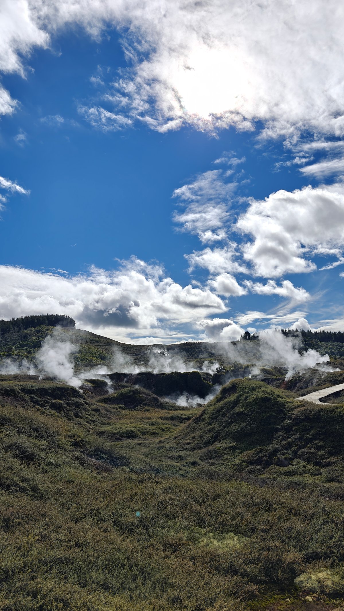 Crater steam against deep blue sky