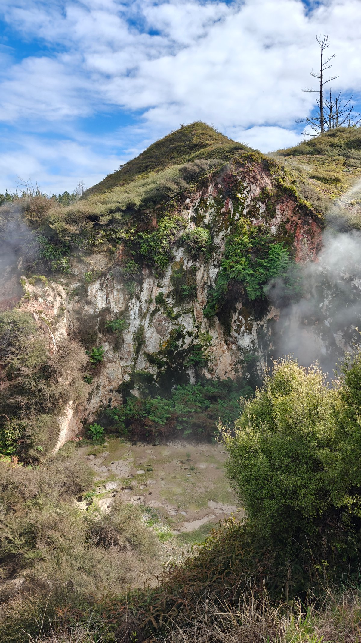 Crater steam under a blue sky