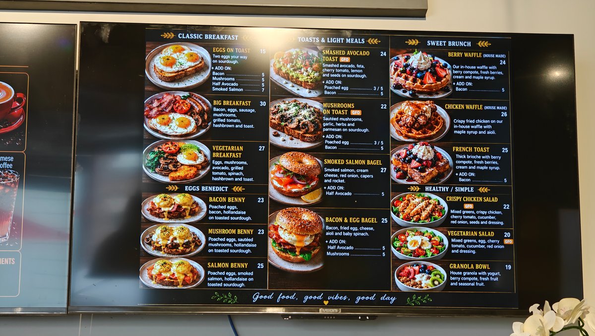 Digital menu screens above the counter
