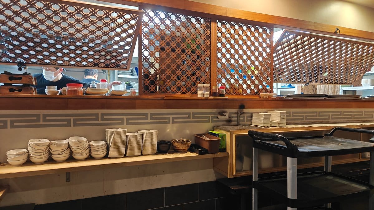 Extraction hoods over each grill