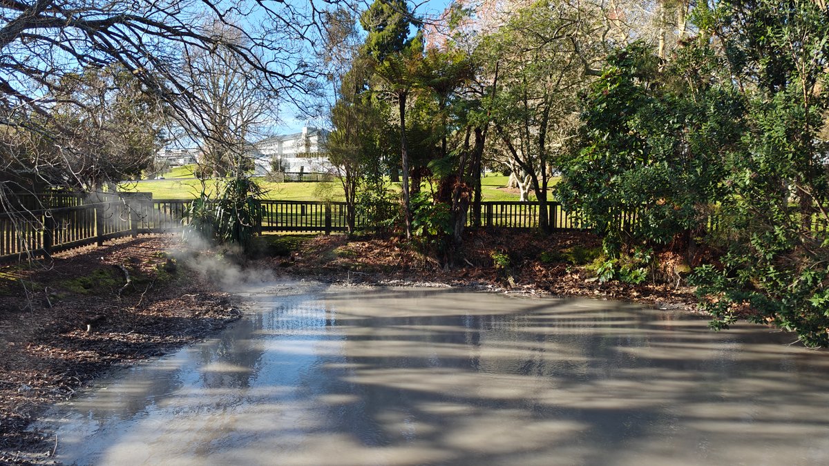 Fenced steaming pool in park