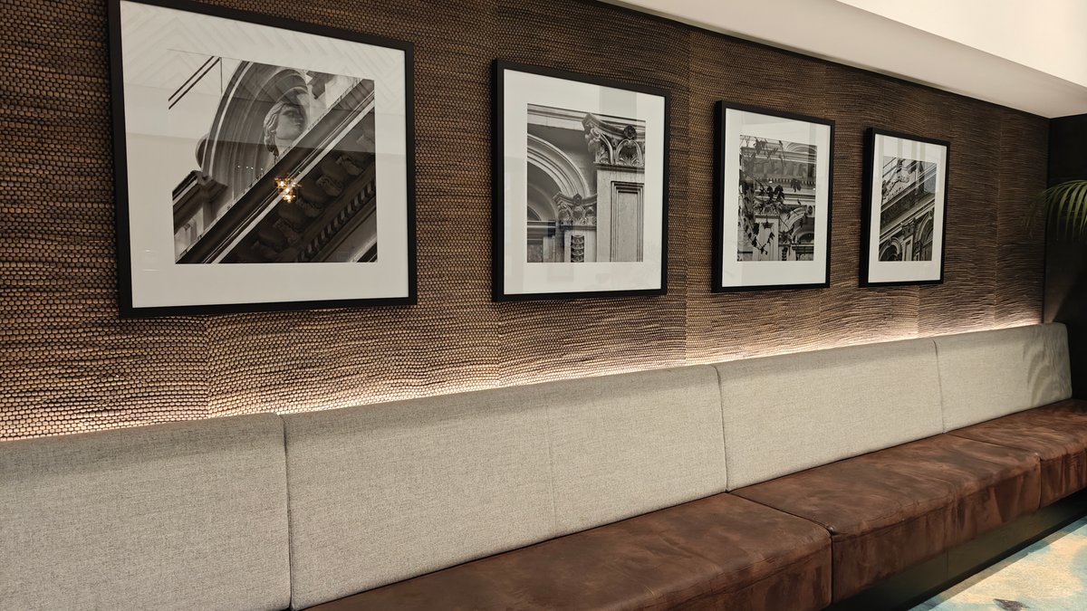 Framed photographs along the lobby