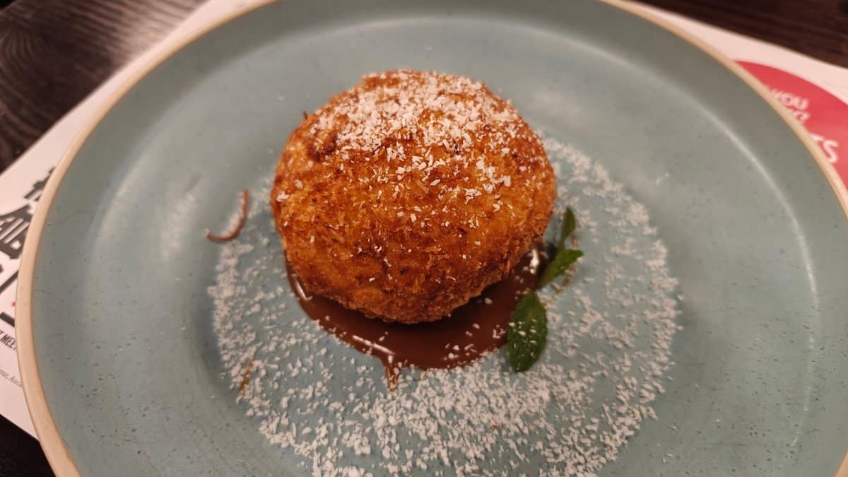 Golden pastry dessert plated