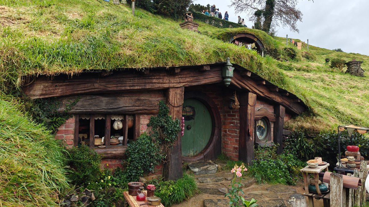 Grand hobbit hole with green door