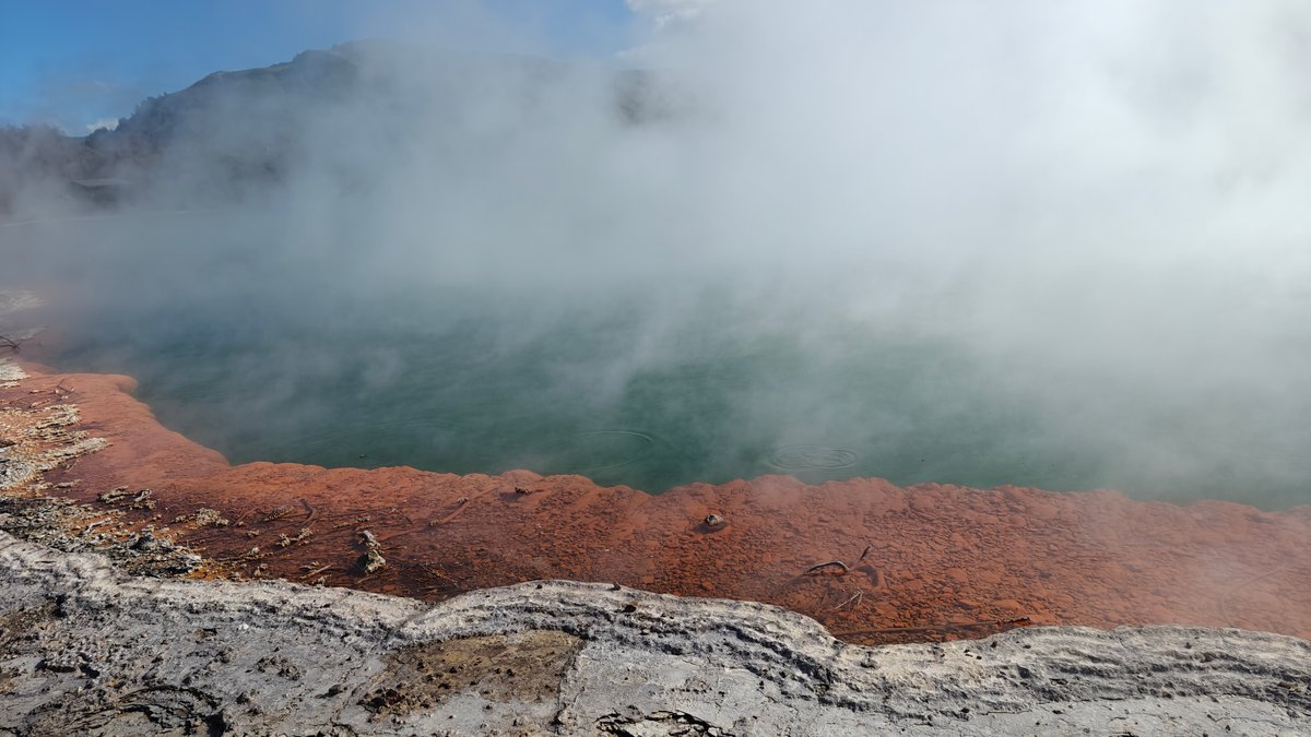 Green pool with orange mineral rim