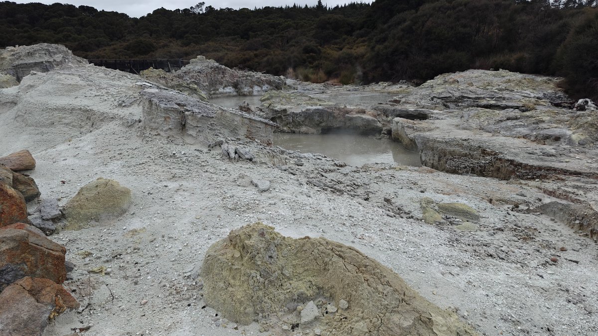Grey sinter terraces in steam
