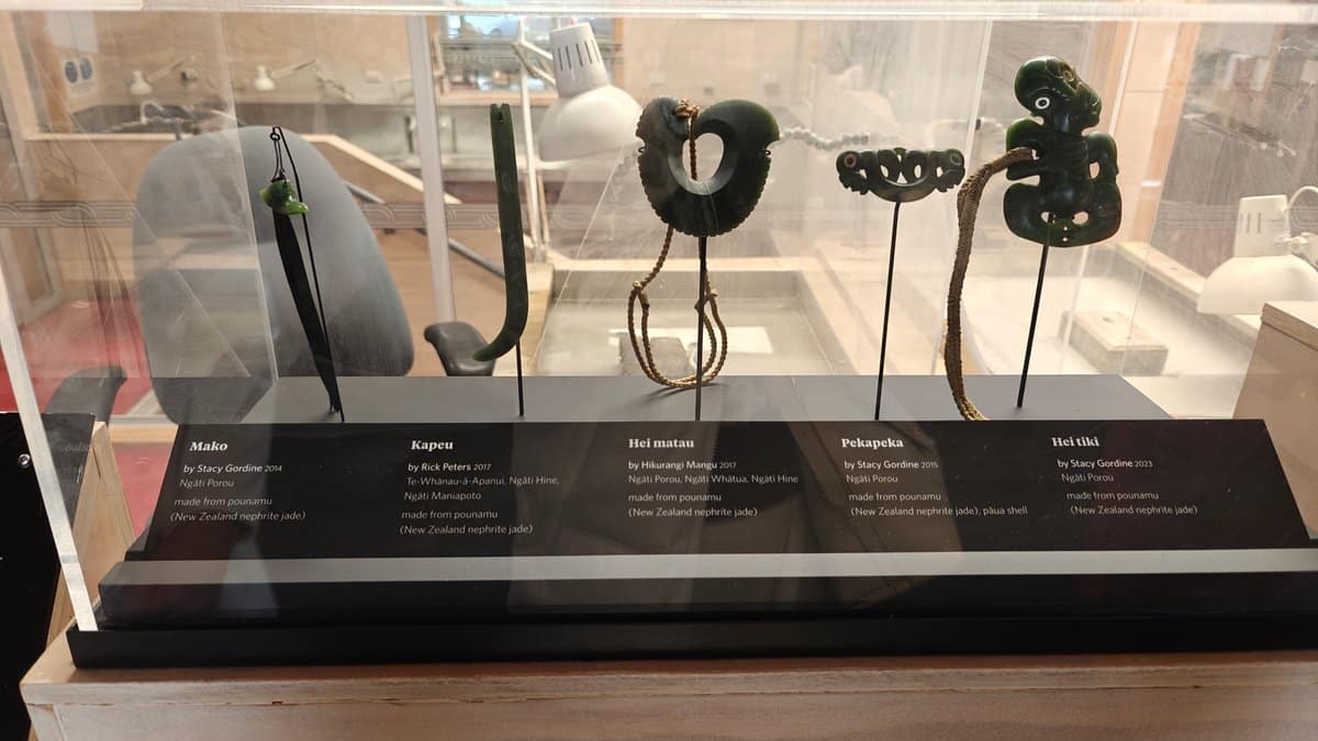 Hei tiki and matau pendants