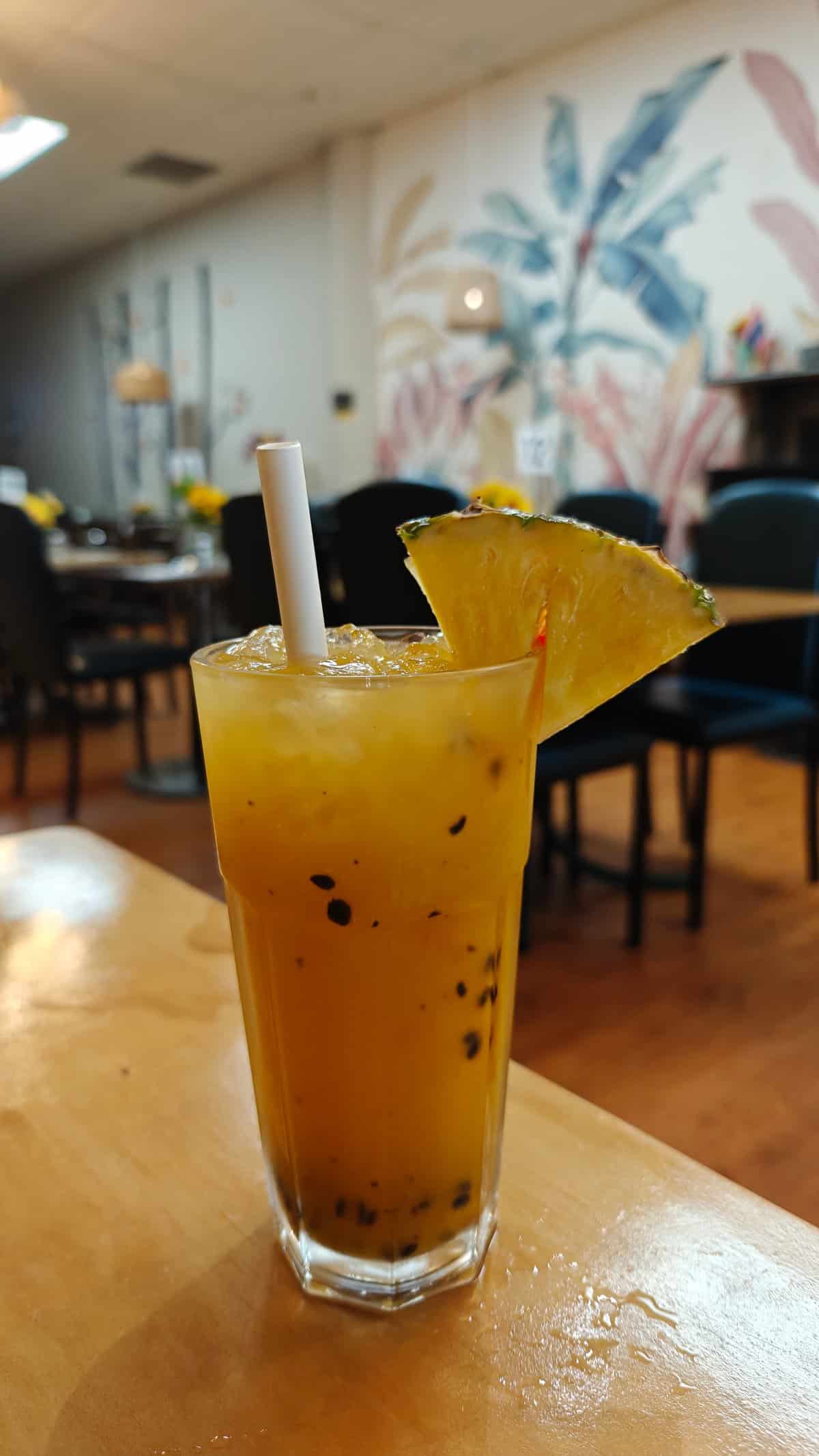 Iced drink with lime garnish