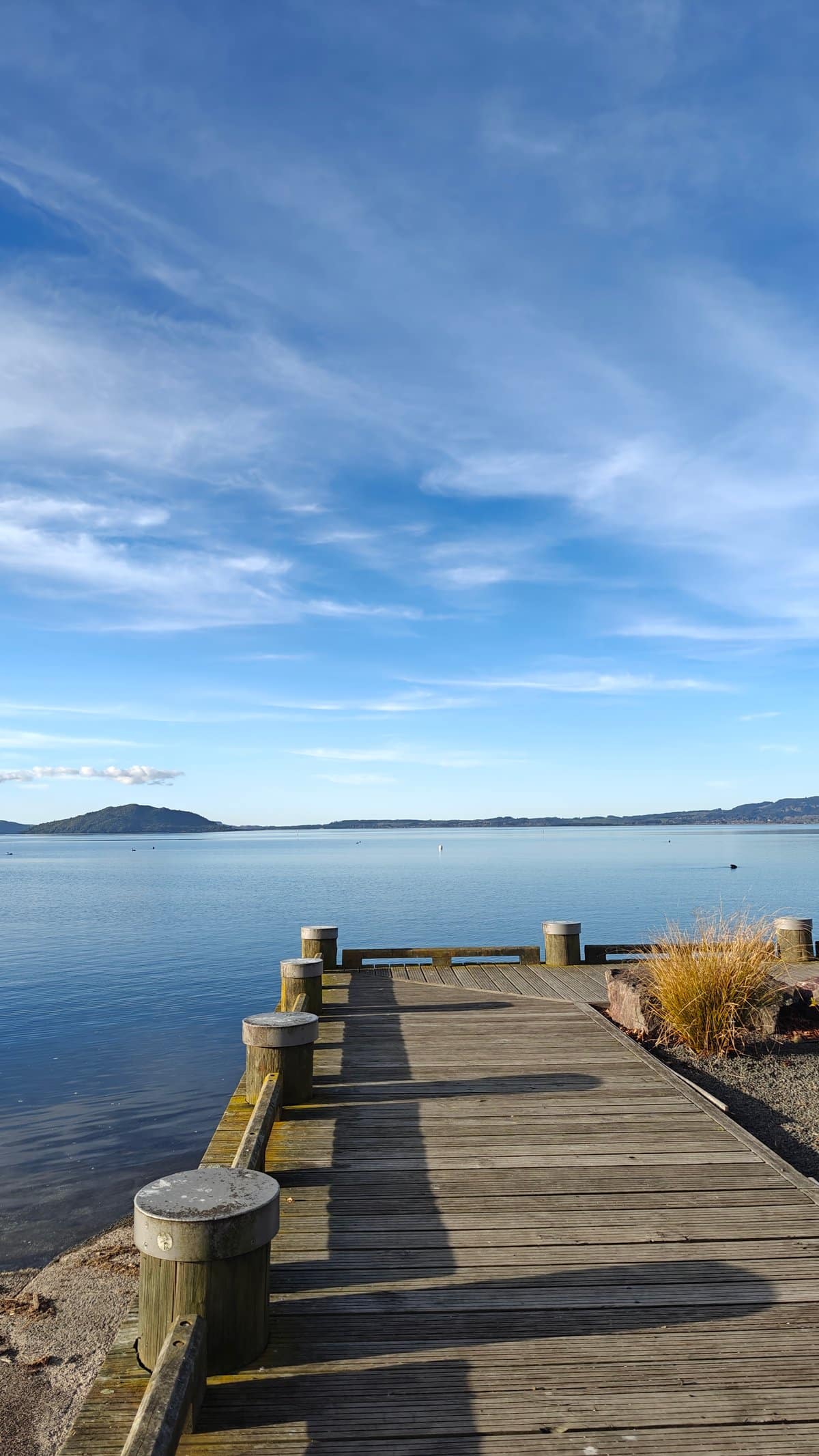 Jetty deck stretching over still water