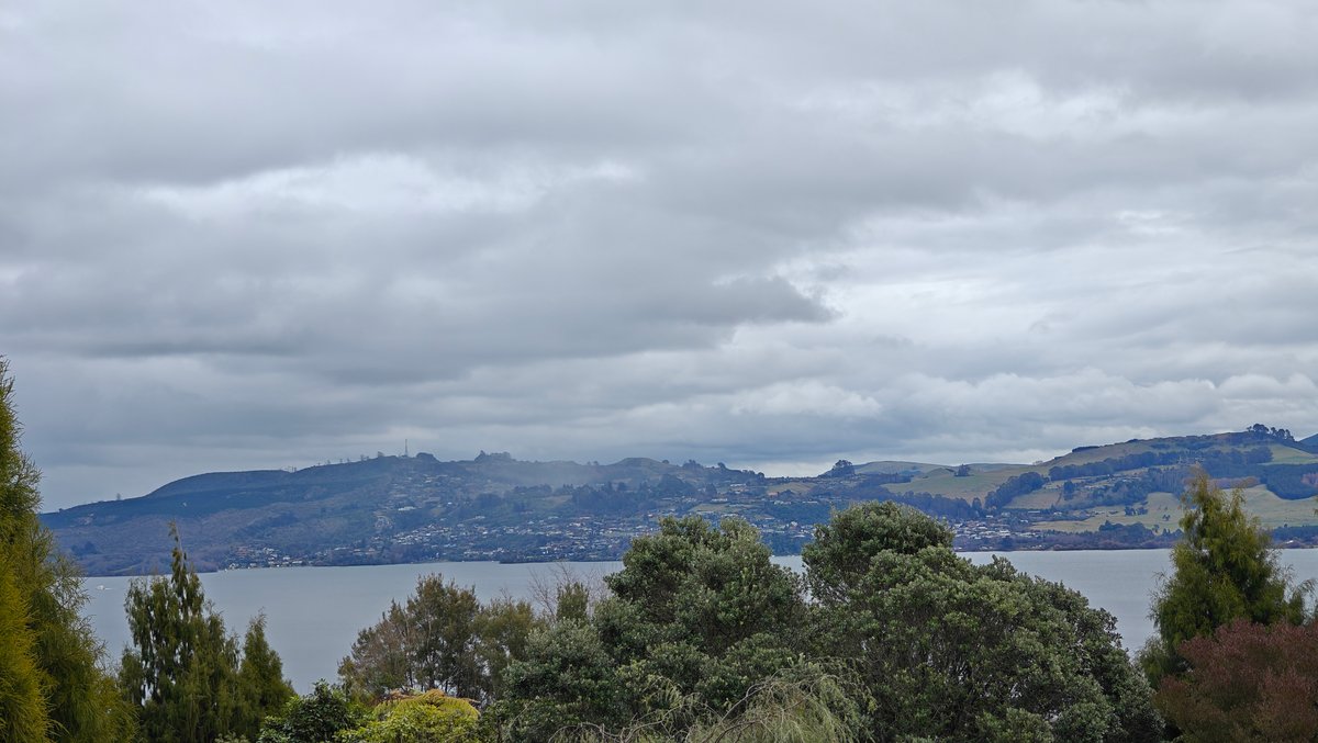 Lake Taupō with the far hills under a