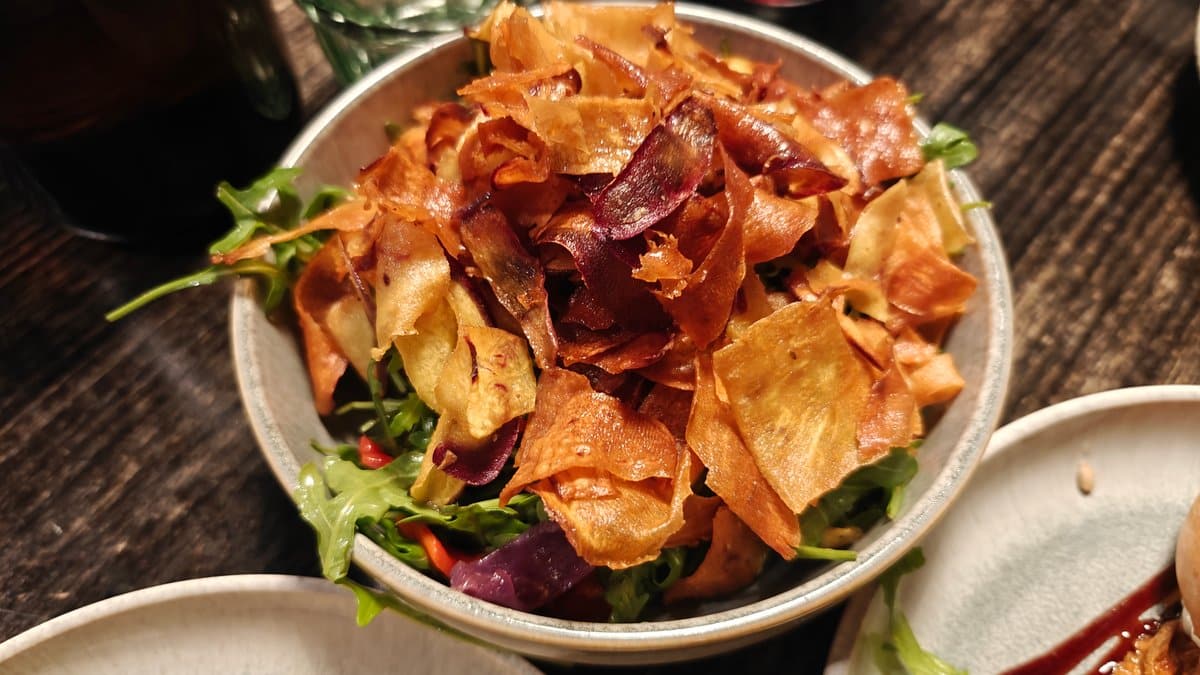 Loaded fries with bacon and herbs