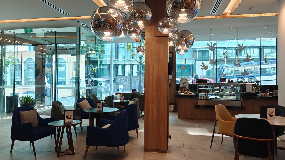 Lobby under mirrored globe pendants