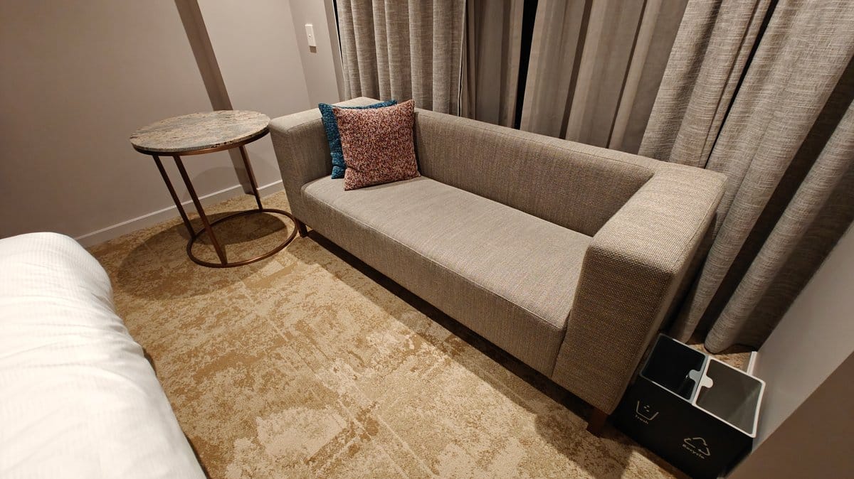 Long sofa under the window