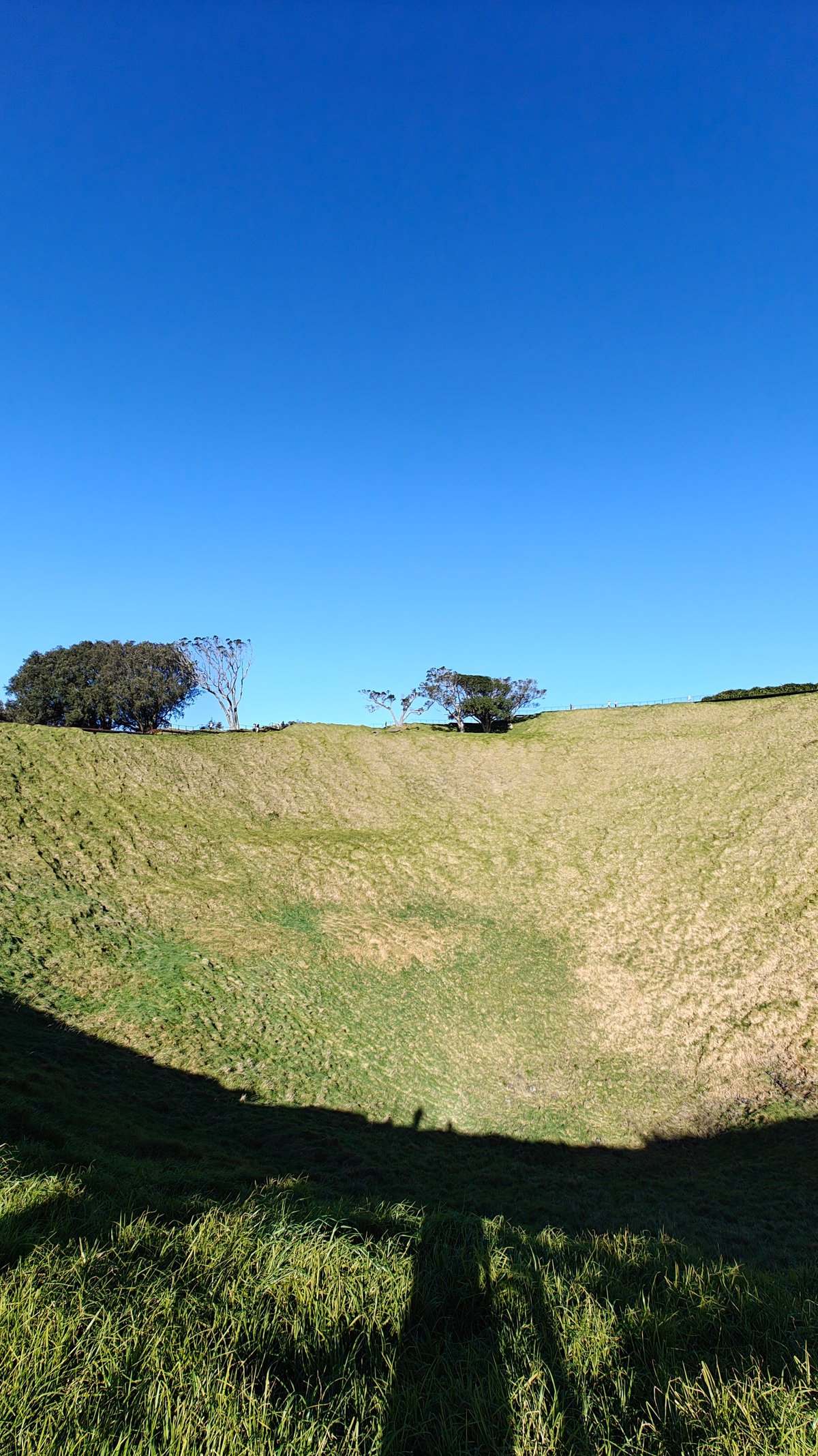 Looking into the grassy crater bowl