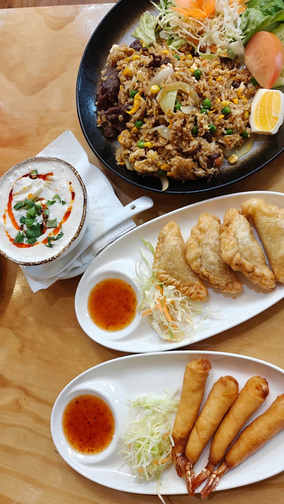 Lunch spread of rice and rolls