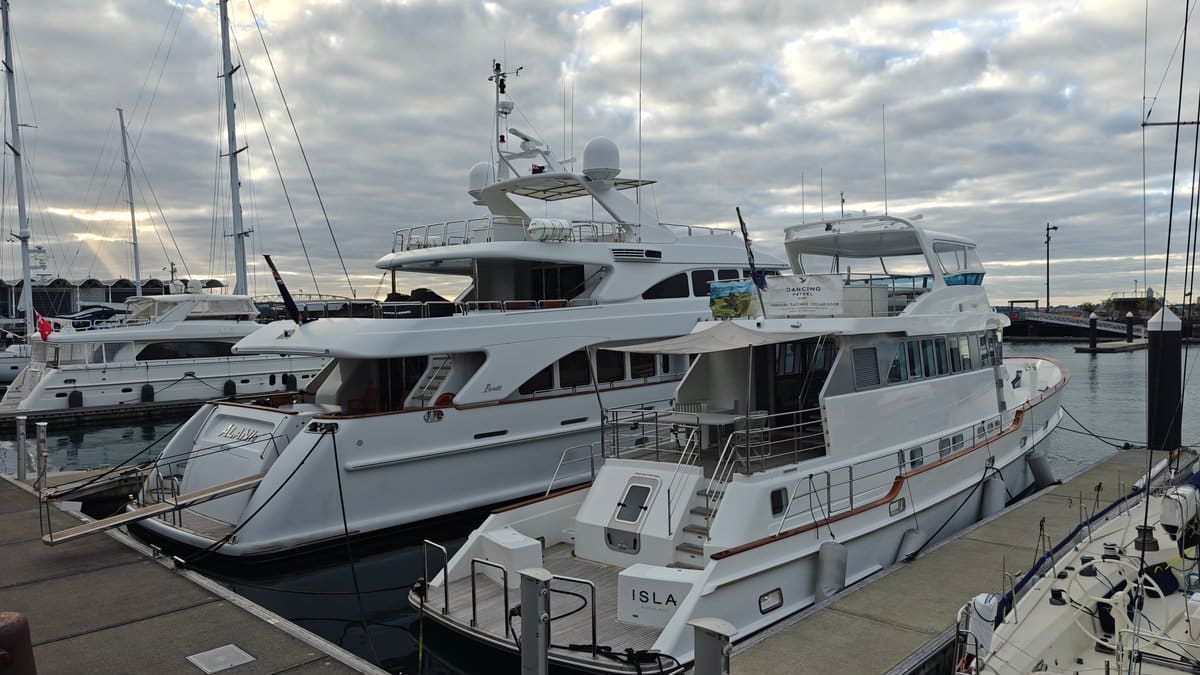 Luxury motor yachts along the pier