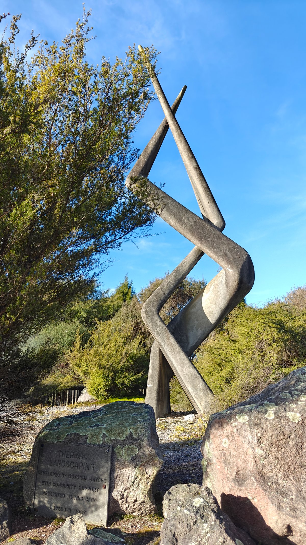 Metal sculpture against blue sky
