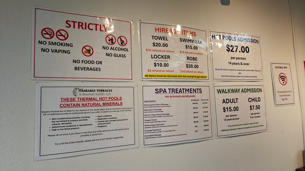 Notice boards at the desk — a strictly