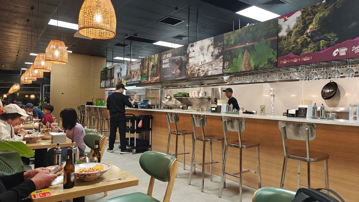 Open kitchen with bar seating
