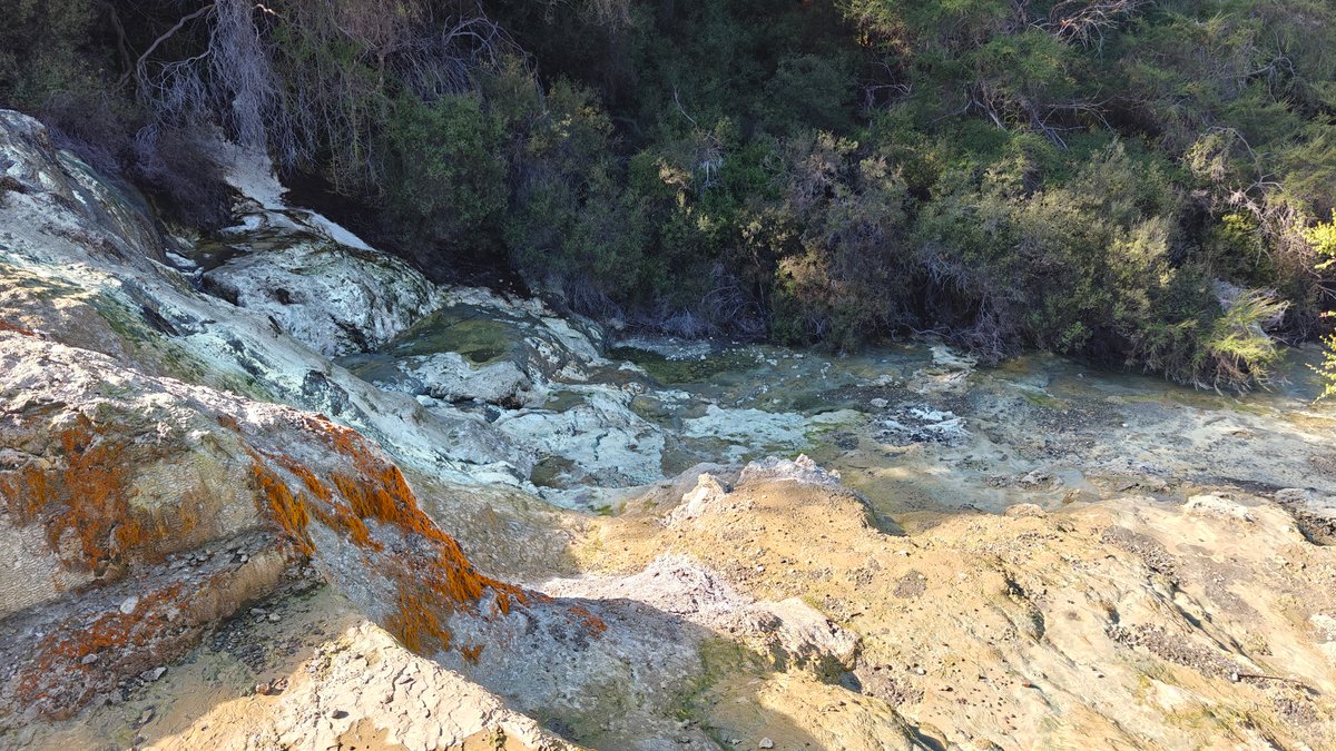 Orange and yellow mineral-stained rock