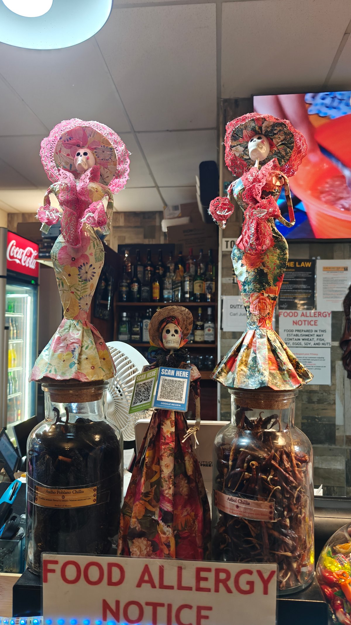 Ornate catrina figures on display