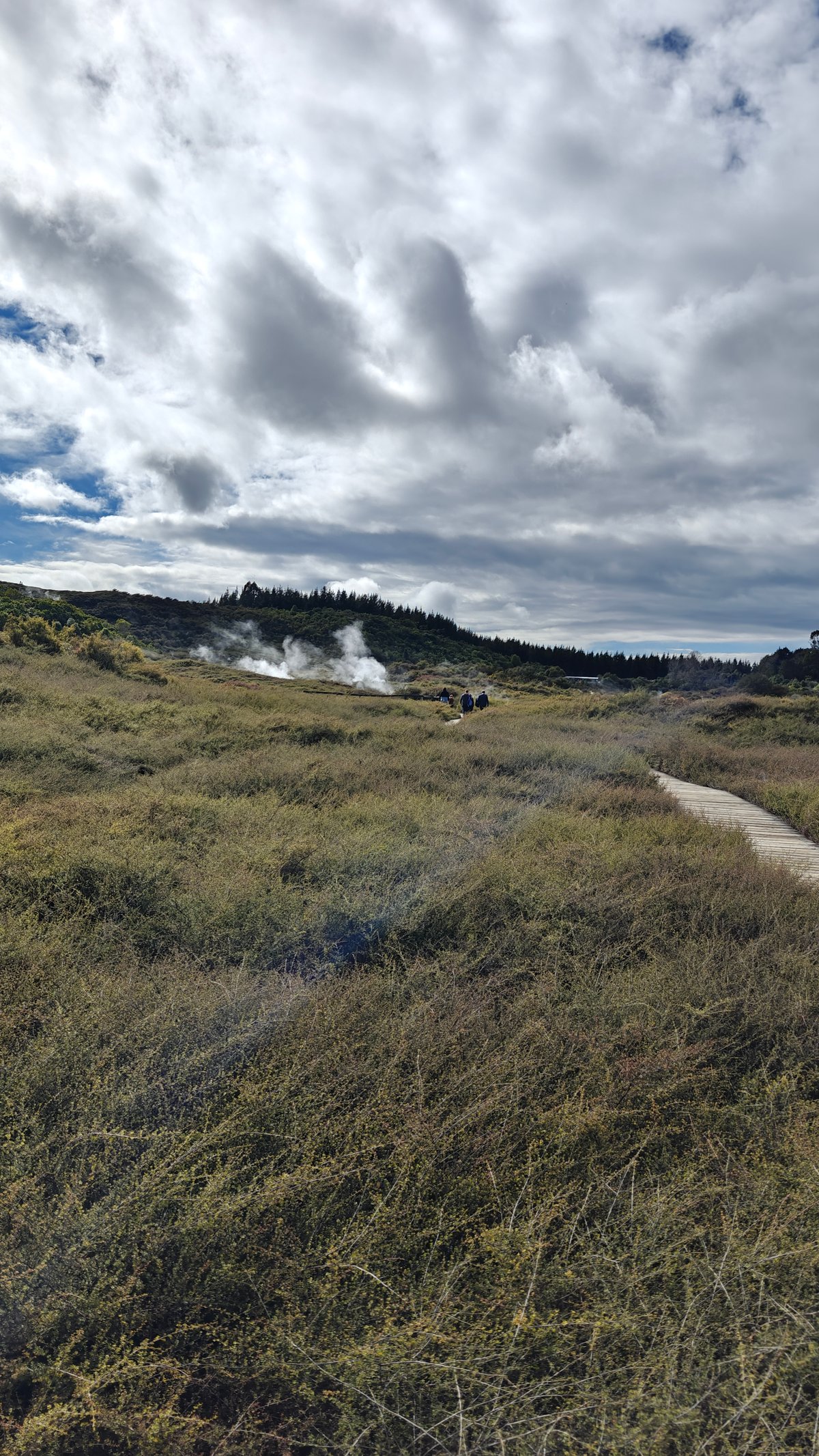 Path with steam and distant hills