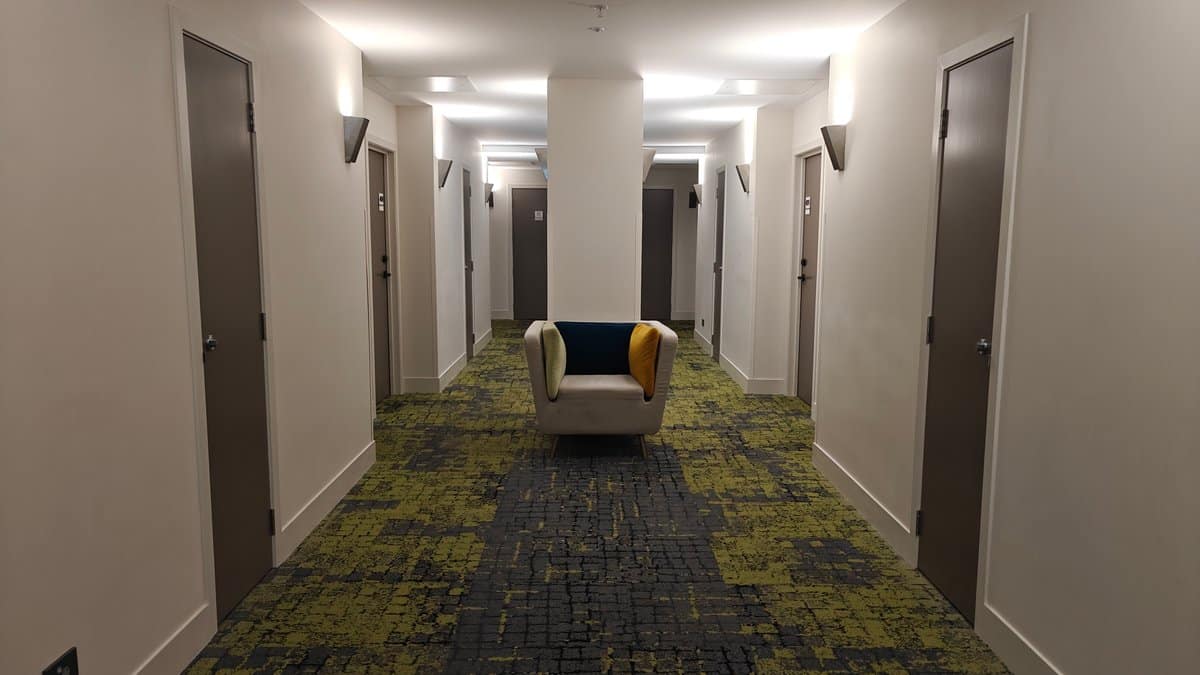 Patterned carpet along guest corridor