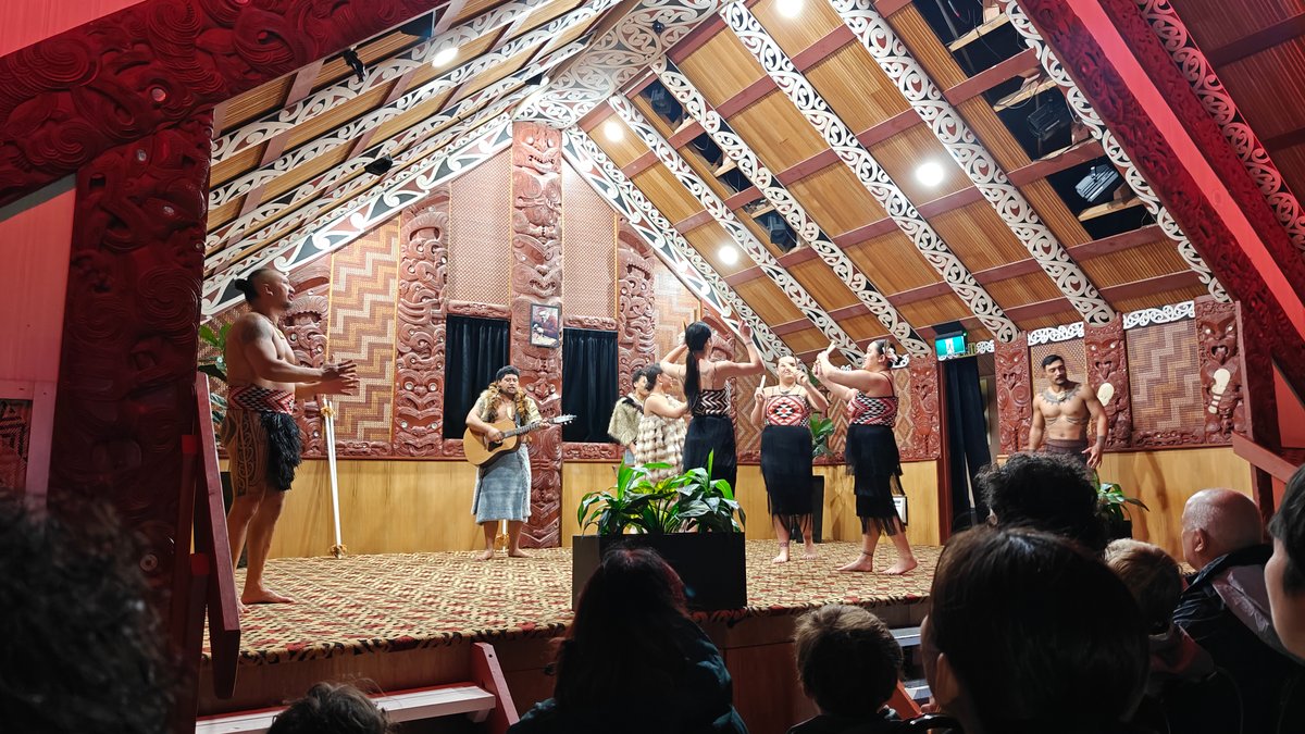 Performers lined across the stage