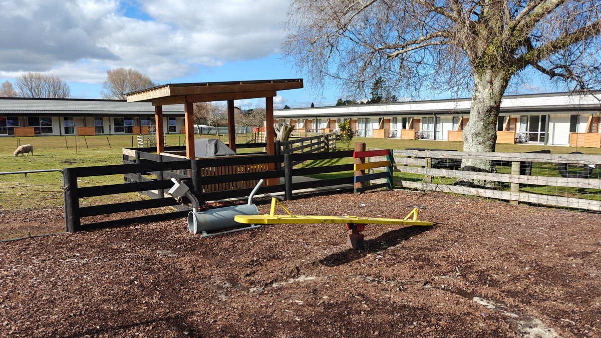 Picnic tables by the paddock fence