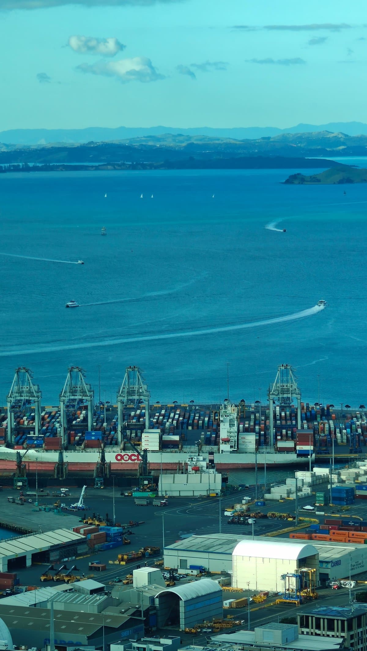 Port cranes and gulf beyond