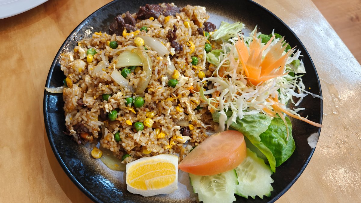 Prawn fried rice on black dish