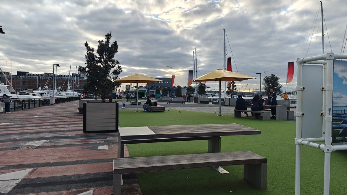 Public lawn benches by the water