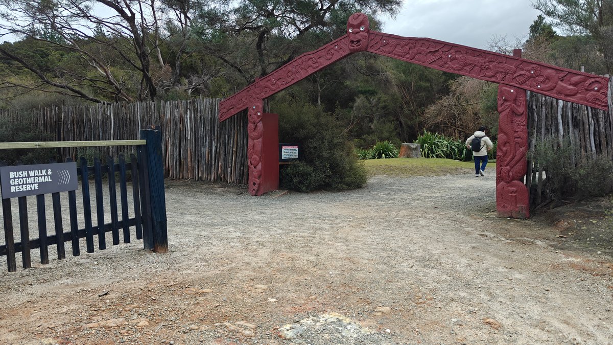 Red carved waharoa gateway
