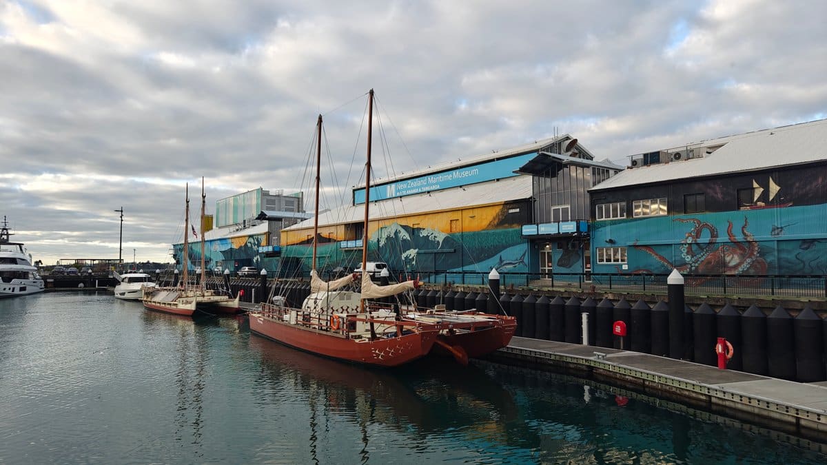 Red-hulled vessel at the wharf