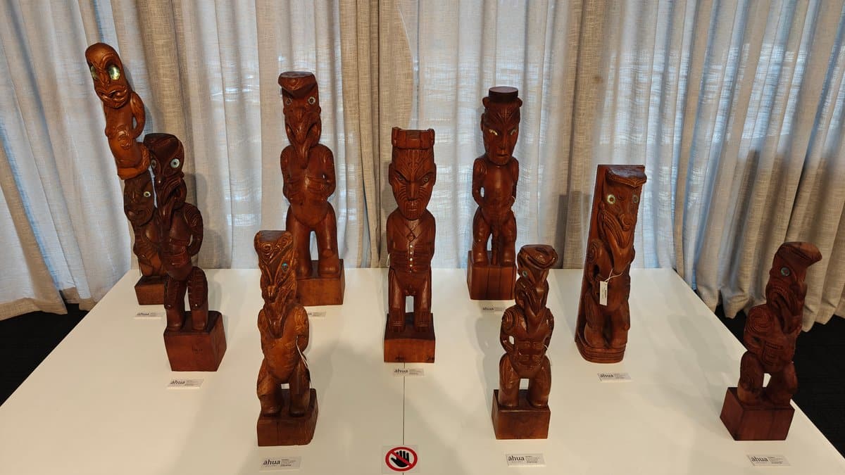Row of carved wooden figures