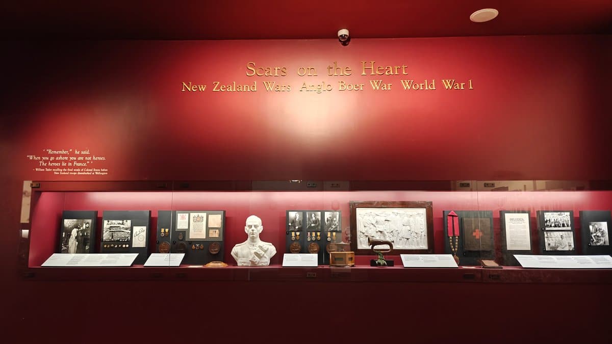 Scars on the Heart red-walled gallery