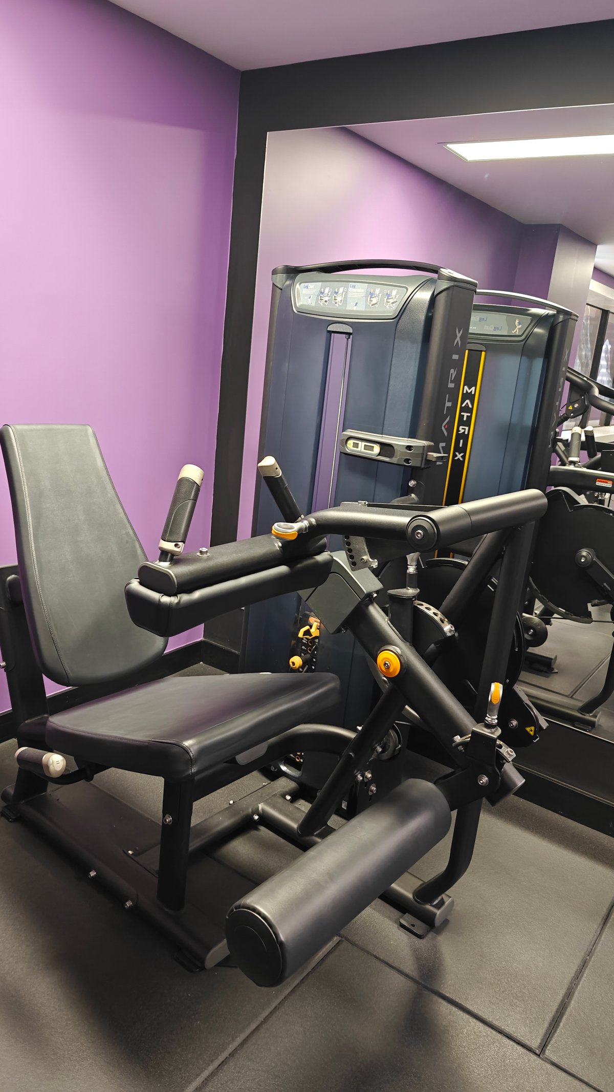 Seated resistance machine on gym floor