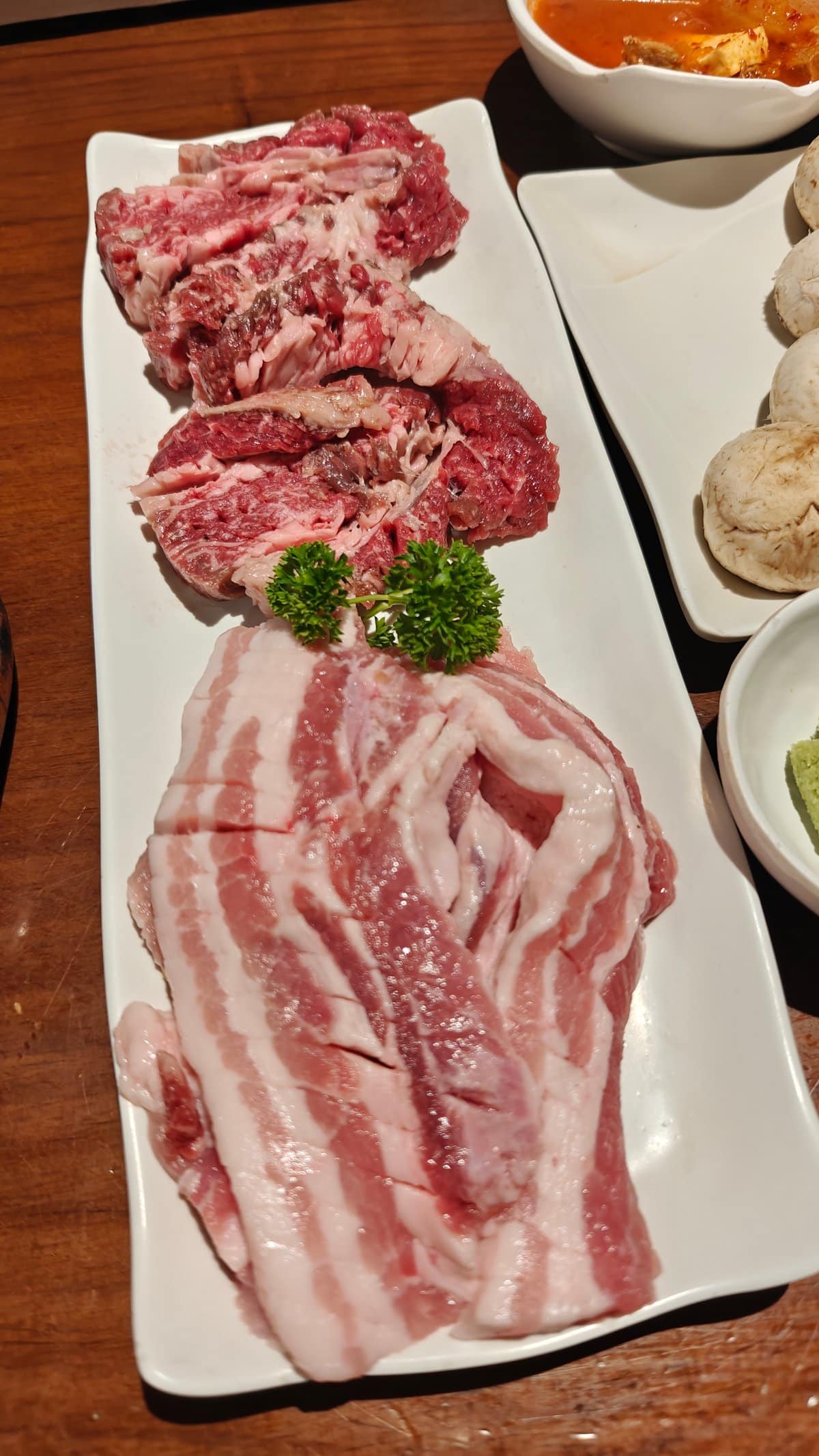 Second platter of raw BBQ cuts