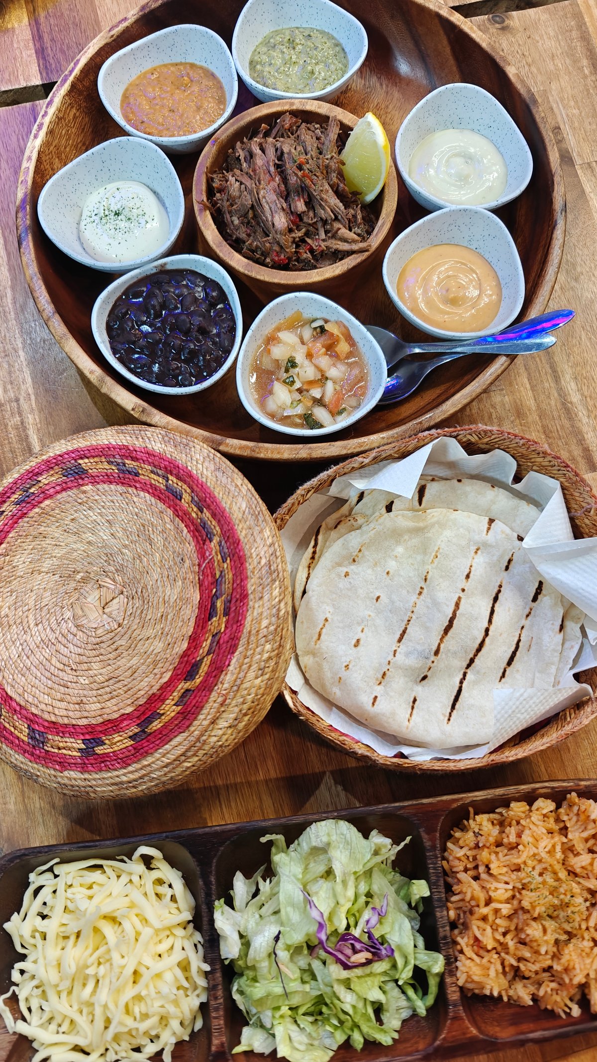 Sharing tray of Mexican dishes