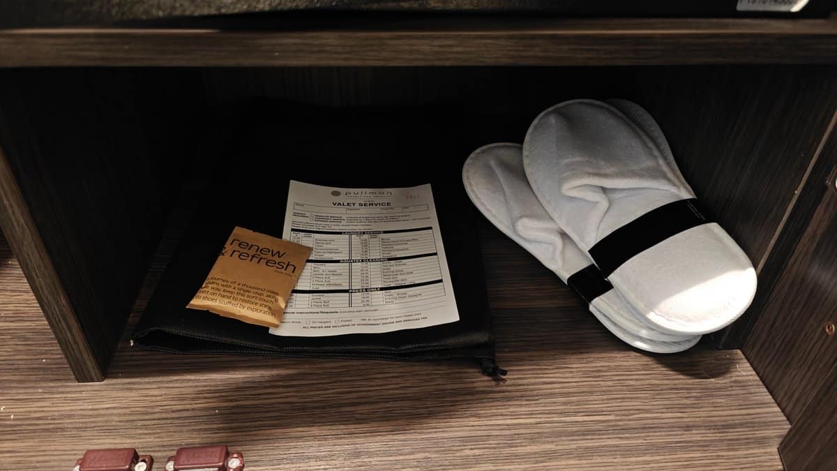Slippers laid out beside information cards