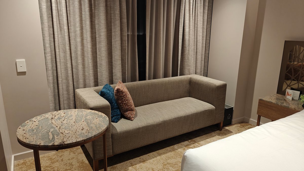 Sofa and table by window