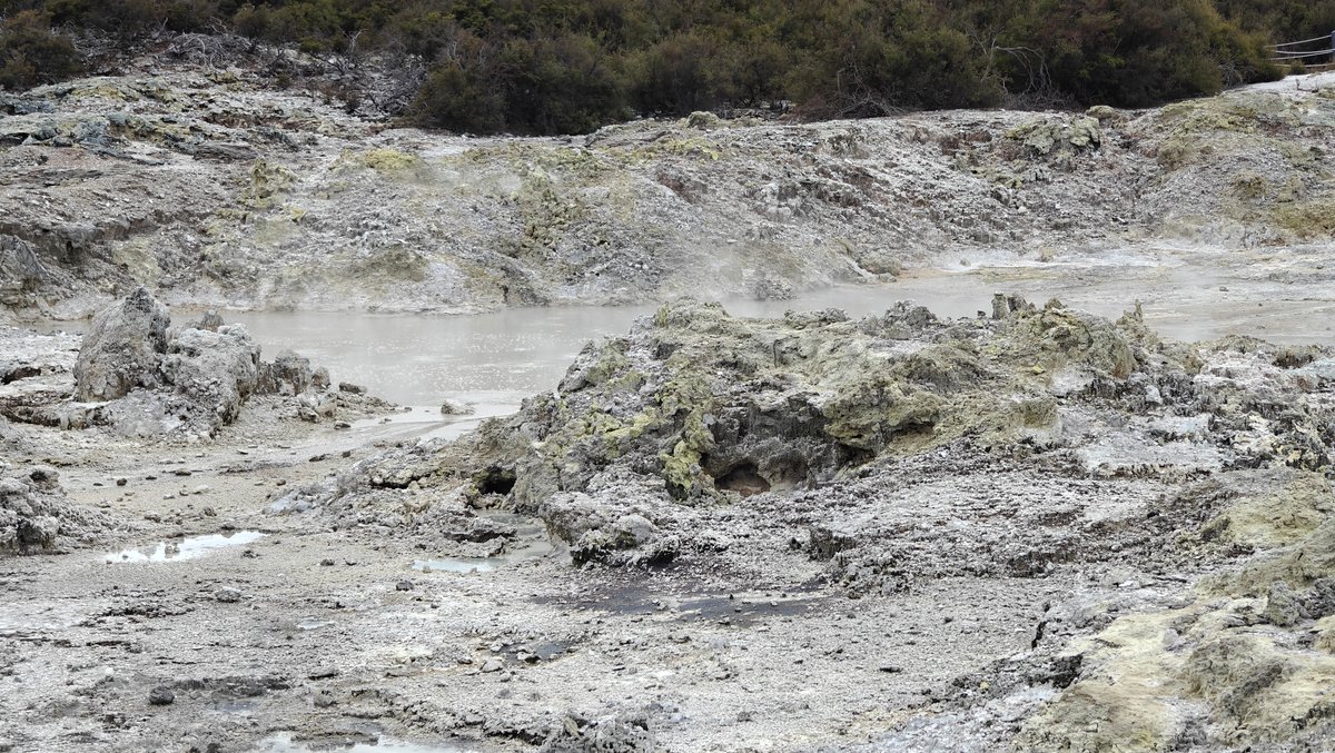 Steaming sinter terraces stepping down