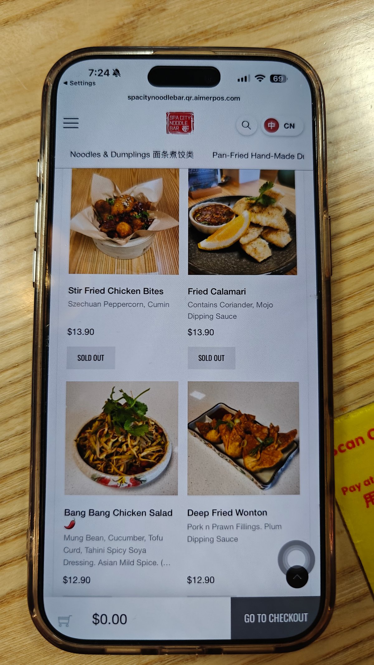 Stir-fried chicken bites and fried calamari at $13.90,