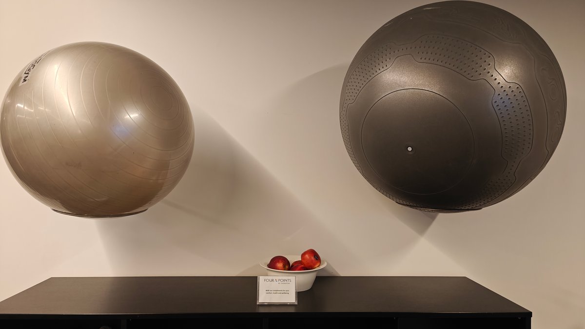 Swiss balls stored on low shelf