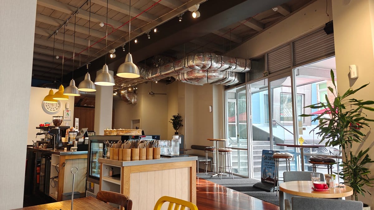 Tables facing the cafe servery