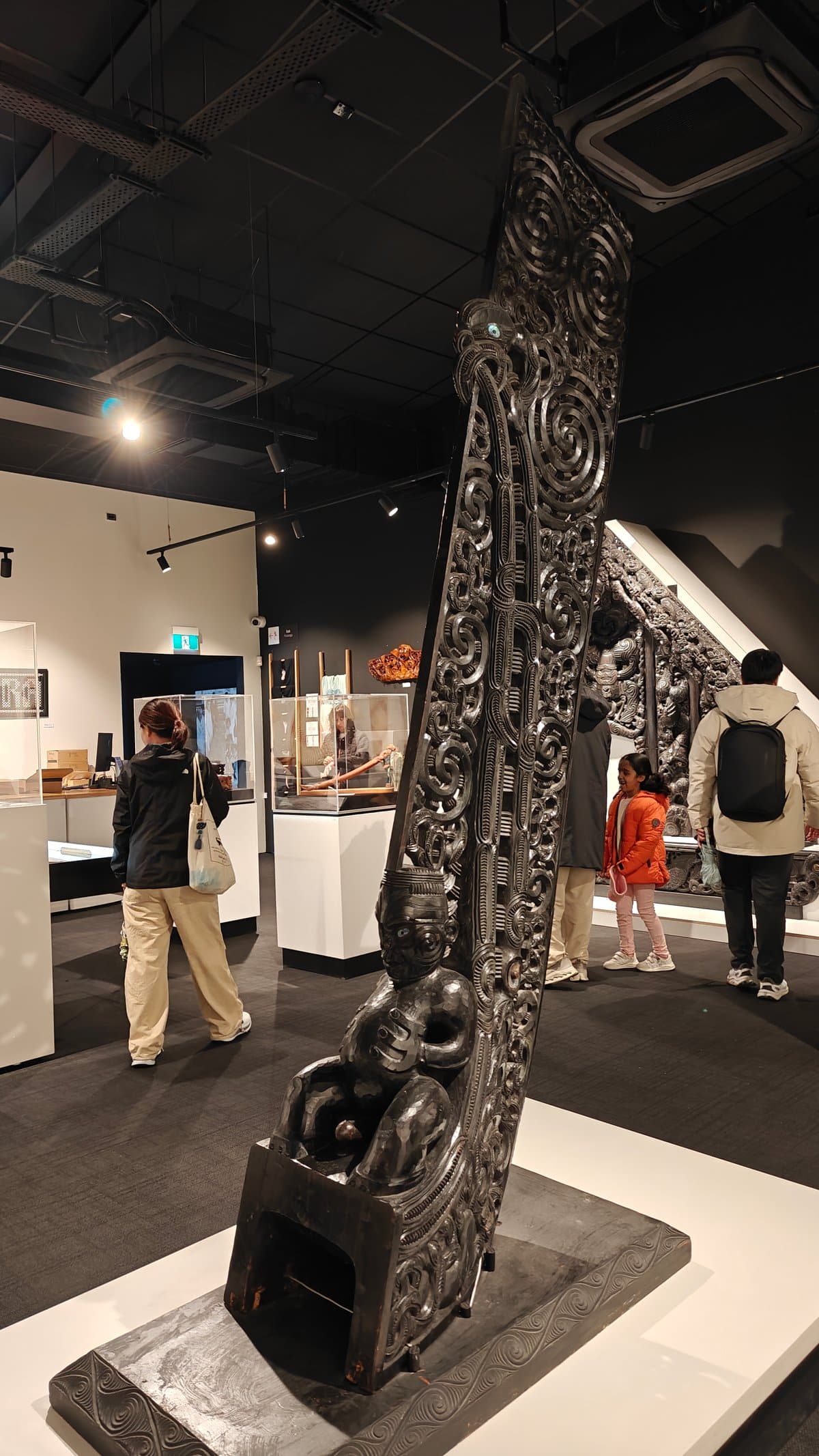 Tall carved amo in gallery